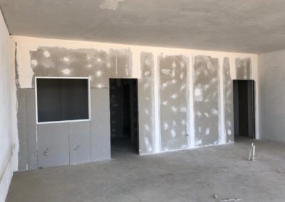 unfinished drywalling